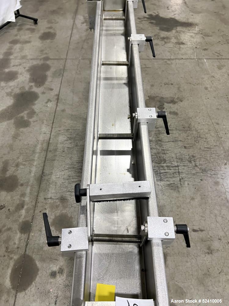 Used BPM Water Bath, Model WBX0606-6, 304 Stainless Steel. 6" wide x 72" long x 6" deep trough. 2" and 1-1/4" outlets fitted with 1" threaded piping. Includes air-knife. Mounted on carbon steel frame...