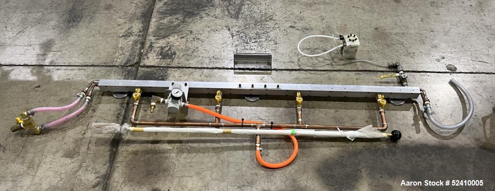 Used BPM Water Bath, Model WBX0606-6, 304 Stainless Steel. 6" wide x 72" long x 6" deep trough. 2" and 1-1/4" outlets fitted with 1" threaded piping. Includes air-knife. Mounted on carbon steel frame...