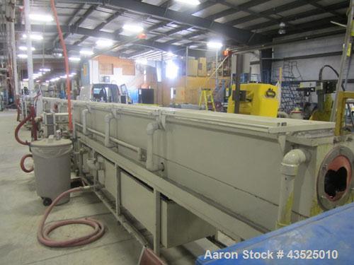 Used CDS Spray Cooling Tank, Model CST12-25, Stainless Steel Construction. 12" x 12" Cross section, 25' long, 8" diameter opening with 2 hp circulation pump, reservoir, water filter, (2) APV plate he...