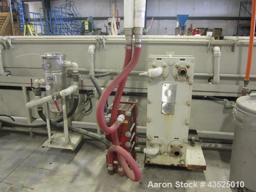 Used CDS Spray Cooling Tank, Model CST12-25, Stainless Steel Construction. 12" x 12" Cross section, 25' long, 8" diameter opening with 2 hp circulation pump, reservoir, water filter, (2) APV plate he...