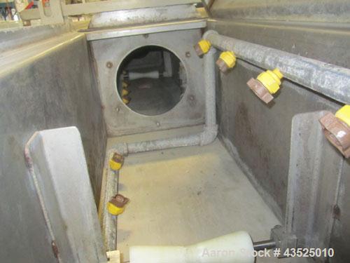 Used CDS Spray Cooling Tank, Model CST12-25, Stainless Steel Construction. 12" x 12" Cross section, 25' long, 8" diameter opening with 2 hp circulation pump, reservoir, water filter, (2) APV plate he...