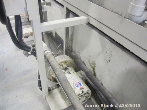 Used CDS Spray Cooling Tank, Model CST12-25, Stainless Steel Construction. 12" x 12" Cross section, 25' long, 8" diameter opening with 2 hp circulation pump, reservoir, water filter, (2) APV plate he...