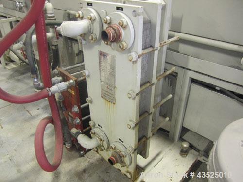 Used CDS Spray Cooling Tank, Model CST12-25, Stainless Steel Construction. 12" x 12" Cross section, 25' long, 8" diameter opening with 2 hp circulation pump, reservoir, water filter, (2) APV plate he...
