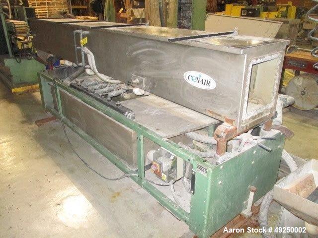 Used Conair Spray Cooling Tank, Model MCB-12-8, Stainless Steel. Approximate 15" x 15" cross section, 12' long. Includes (1) circulating pump. Mounted on a carbon steel frame on casters. Serial# 1803...