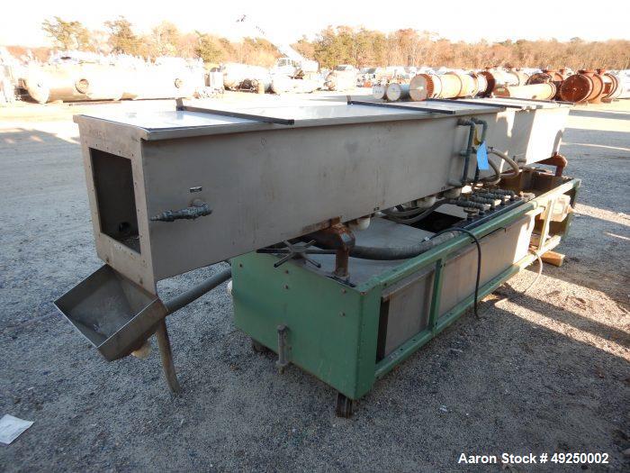 Used Conair Spray Cooling Tank, Model MCB-12-8, Stainless Steel. Approximate 15" x 15" cross section, 12' long. Includes (1) circulating pump. Mounted on a carbon steel frame on casters. Serial# 1803...