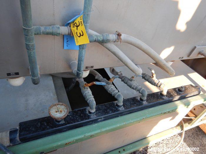 Used Conair Spray Cooling Tank, Model MCB-12-8, Stainless Steel. Approximate 15" x 15" cross section, 12' long. Includes (1) circulating pump. Mounted on a carbon steel frame on casters. Serial# 1803...