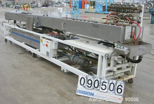 Used: Extrusion Services Inc.(ESI) spray cooling tank, 304 stainless steel. 26" wide x 11" deep x 21' long.(3) sections of 4' long covers. Includes holding tank,(2) pumps, filter, heat exchanger, vac...