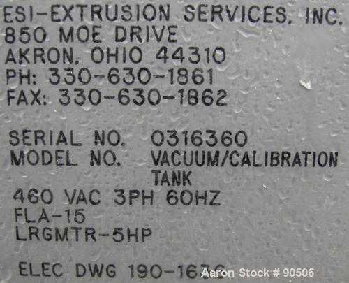 Used: Extrusion Services Inc.(ESI) spray cooling tank, 304 stainless steel. 26" wide x 11" deep x 21' long.(3) sections of 4' long covers. Includes holding tank,(2) pumps, filter, heat exchanger, vac...