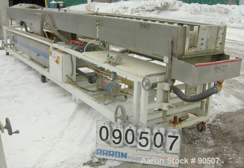 Used: Extrusion Services Inc (ESI) Spray Cooling Tank, 304 stainless steel. 26" wide x 11" deep x 20'4" long. (3) sections of 4' long covers. Includes holding tank, pump, filter, heat exchanger and c...