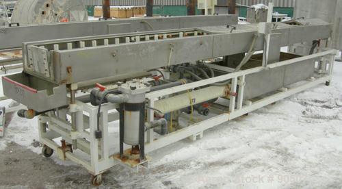 Used: Extrusion Services Inc (ESI) Spray Cooling Tank, 304 stainless steel. 26" wide x 11" deep x 20'4" long. (3) sections of 4' long covers. Includes holding tank, pump, filter, heat exchanger and c...
