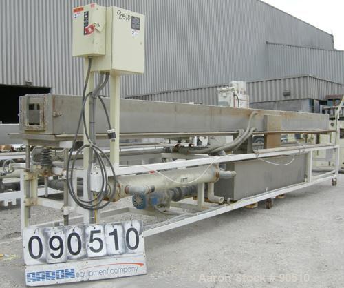 Used: Extrusion Services Inc (ESI) spray cooling tank, 304 stainless steel. 16" wide x 11" deep x 20' long. (4) section top cover. Includes holding tank ,pump, heat exchanger and control panel. Mount...