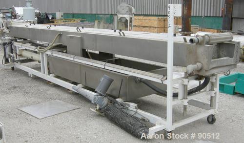 Used: Extrusion Services Inc (ESI) spray cooling tank, 304 stainless steel. 26" wide x 11" deep x 21'6" long. (5) section top cover. Includes holding tank, pump, heat exchanger and control panel. Mou...