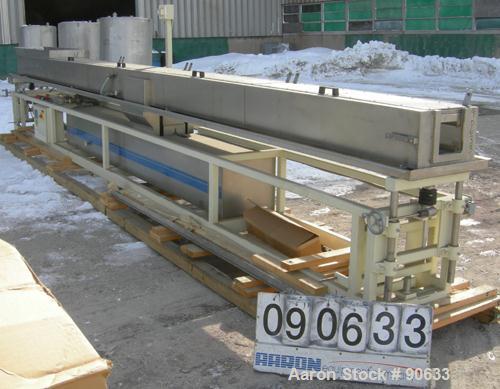 Unused: Extrusion Services Inc.(ESI) spray cooling tank, 304 stainless steel. 16" wide x 11" deep x 25' long.(4) section top cover (1) missing. Includes holding tank,pump, heat exchanger,and control ...