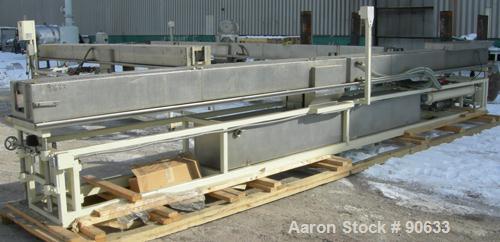 Unused: Extrusion Services Inc.(ESI) spray cooling tank, 304 stainless steel. 16" wide x 11" deep x 25' long.(4) section top cover (1) missing. Includes holding tank,pump, heat exchanger,and control ...