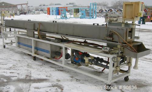 Used: Extrusion Services Inc.(ESI) spray cooling tank, 304 stainless steel. 16" wide x 11" deep x 20' long.(4) section top cover. Includes holding tank,pump, heat exchanger,and control panel. Mounted...