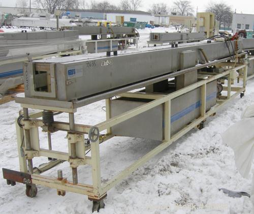 Used: Extrusion Services Inc.(ESI) spray cooling tank,304 stainless steel. 16" wide x 11" deep x 20' long.(4) section top cover. Includes holding tank,pump, heat exchanger,and control panel. Mounted ...