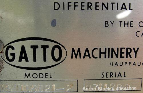 Used Gatto spray cooling tank, model WST105B21-2, 304 stainless steel. (4) compartment, 12" wide x 252" long x 12" deep. (4) piece top cover, (4) spray pipes with nozzles, 20' long. Mounted on a carb...
