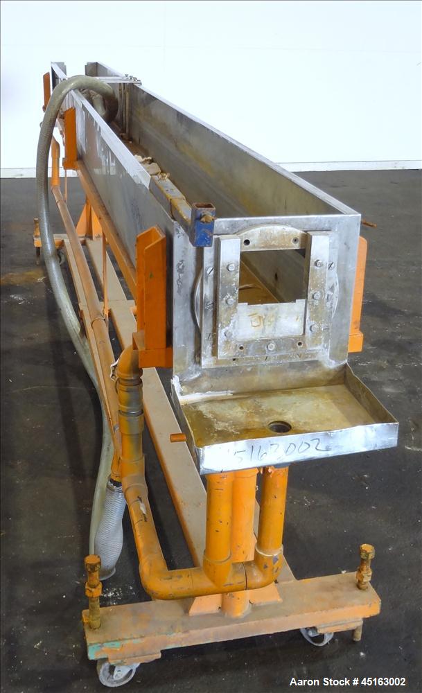 Used OEM Water Tank, 304 Stainless Steel, 185" long x 12" wide x 12" deep. Mounted on a carbon steel frame with casters.