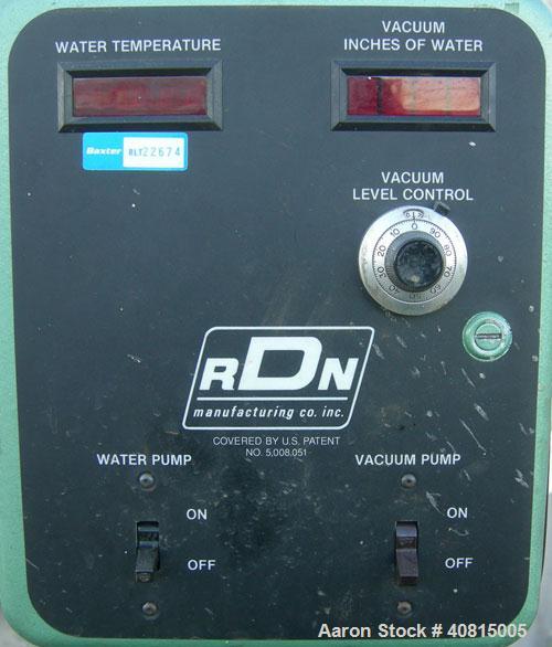 Used RDN Vacuum Sizing Tank, Model 20 P.V.S., 304 Stainless Steel.  6 1/2" wide x 6" deep x 96" long.  (1) 75" long section with cover.   Includes a holding tank, heat exchanger and pump.  Mounted on...