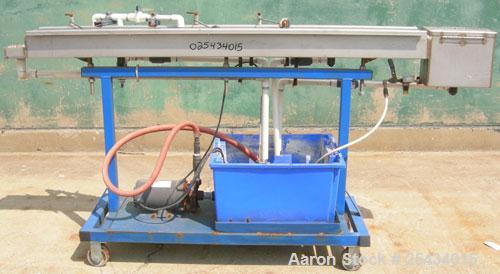 Used- Waterbath, 304 Stainless Steel. 4 3/4" wide x 72" long x 5" deep. Includes a pump, driven by a 3/4 hp, 1/60/115/230 vo...