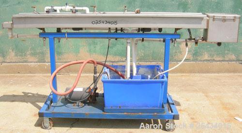 Used Waterbath, 304 Stainless Steel. 4 3/4" wide x 72" long x 5" deep. Includes a pump, driven by a 3/4 hp, 1/60/115/230 volt, 3450 rpm motor, and plastic holding tank. Mounted on a carbon steel fram...