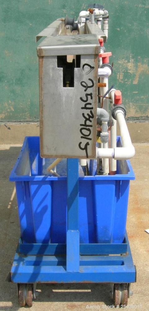 Used Waterbath, 304 Stainless Steel. 4 3/4" wide x 72" long x 5" deep. Includes a pump, driven by a 3/4 hp, 1/60/115/230 volt, 3450 rpm motor, and plastic holding tank. Mounted on a carbon steel fram...