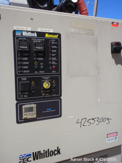 Used AEC Whitlock Nomad Series Drying and Conveying System. (1) AEC model PD-4AQ dehumidifying dryer, approximate 150 cfm process air flow, 3/60/460 volt, 35.1 amp. (1) 12 Cubic foot drying hopper. (...