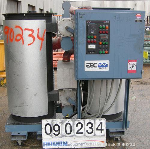 Used AEC High Capacity Dehumidifying Dryer, Model WD-600.  Approximately 600 CFM. 3/60/460 Volt, 77.75 AMP, 61.94 KVA. Includes a control panel and 4 drying hoppers. Frame mounted with casters.