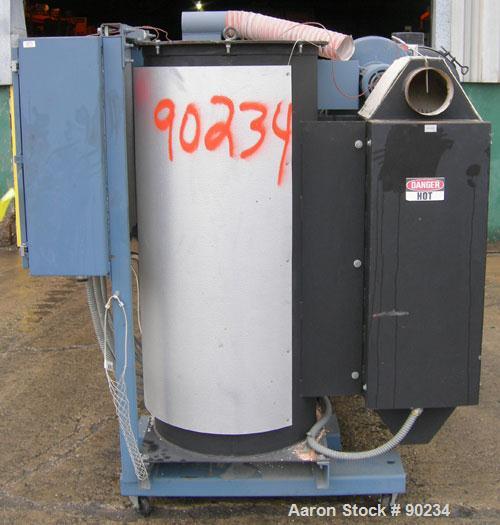 Used AEC High Capacity Dehumidifying Dryer, Model WD-600.  Approximately 600 CFM. 3/60/460 Volt, 77.75 AMP, 61.94 KVA. Includes a control panel and 4 drying hoppers. Frame mounted with casters.