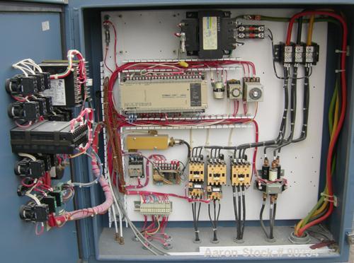 Used AEC High Capacity Dehumidifying Dryer, Model WD-600.  Approximately 600 CFM. 3/60/460 Volt, 77.75 AMP, 61.94 KVA. Includes a control panel and 4 drying hoppers. Frame mounted with casters.
