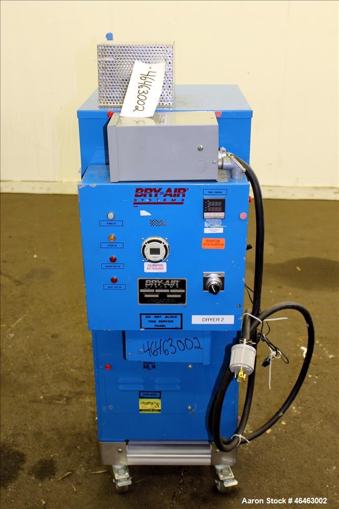 Used Bry-Air Systems RD Series Resin Desiccant Dryer, Model RD-50. Process CFM 30 at 10" ESP, drying capacity 35 to 60 pounds per hour depending on product. Includes blower, desiccant beds, and a con...