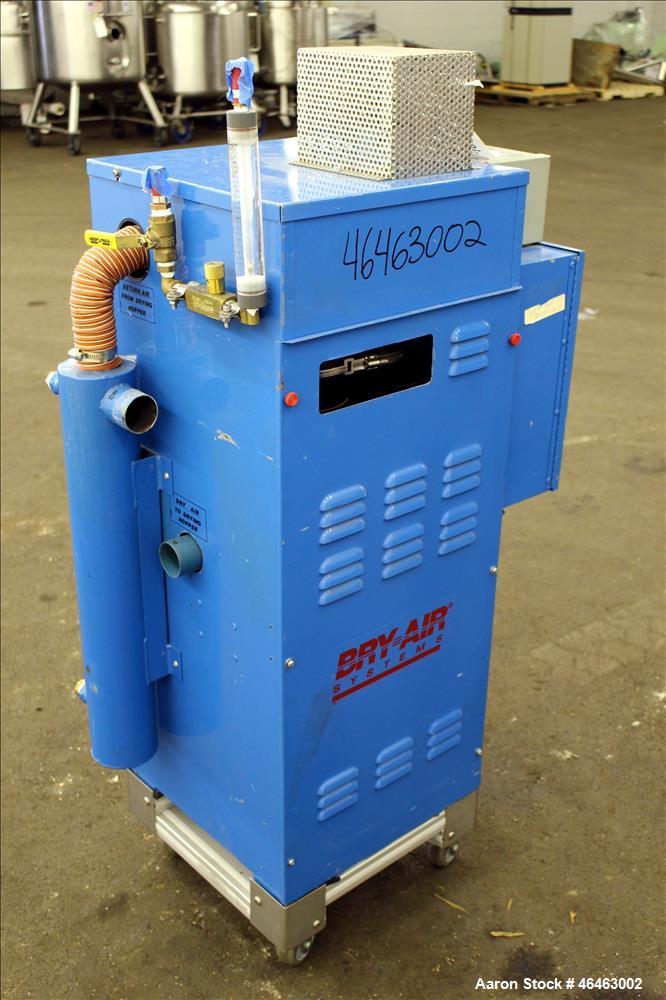 Used Bry-Air Systems RD Series Resin Desiccant Dryer, Model RD-50. Process CFM 30 at 10" ESP, drying capacity 35 to 60 pounds per hour depending on product. Includes blower, desiccant beds, and a con...