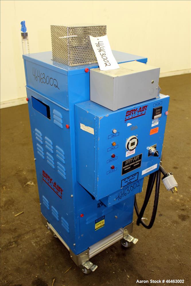 Used Bry-Air Systems RD Series Resin Desiccant Dryer, Model RD-50. Process CFM 30 at 10" ESP, drying capacity 35 to 60 pounds per hour depending on product. Includes blower, desiccant beds, and a con...