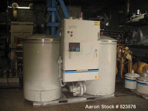 USED: Cincinnati Milacron model CCD2700 dual solid bed desiccantdryer. 1993 model year. 1500 process crm, 460/3/60 operation. 160.3full load amps, 60 kw process and regeneration, 120/1/60 micro-proce...
