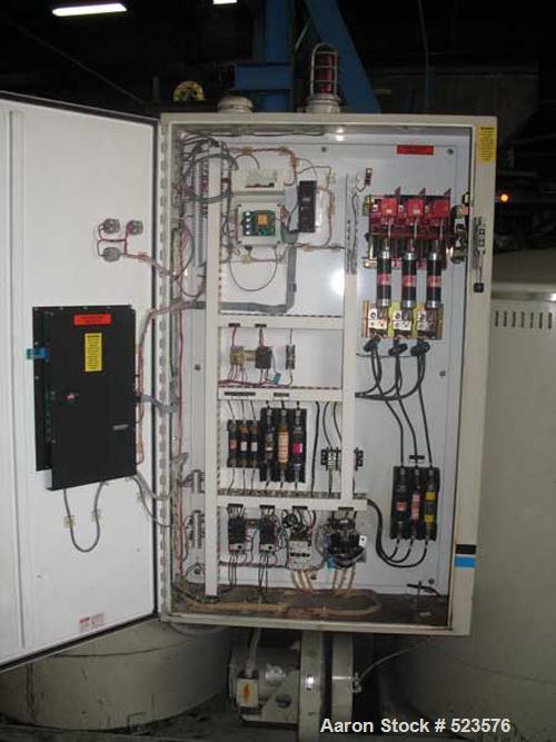USED: Cincinnati Milacron model CCD2700 dual solid bed desiccantdryer. 1993 model year. 1500 process crm, 460/3/60 operation. 160.3full load amps, 60 kw process and regeneration, 120/1/60 micro-proce...