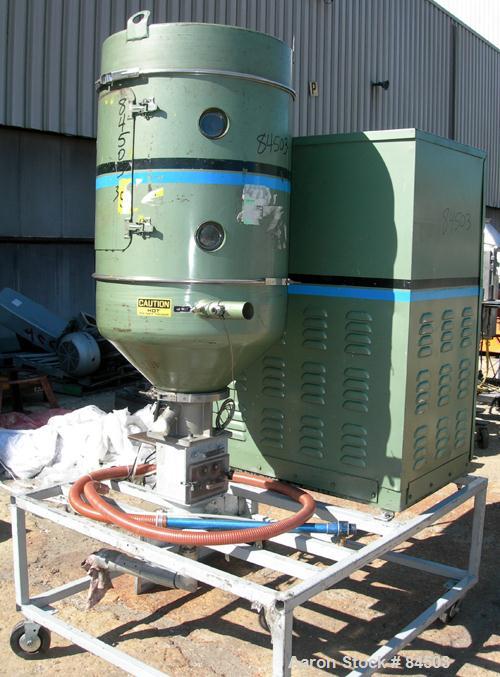 USED: Cincinnati Milacron Dryer, model DD-100. Temp range approximately 170 to 250 deg F. Air flow approximately 75 cfm. 3/60/460 volt, 14 amp. Includes an insulated hopper. Mounted on a frame with c...