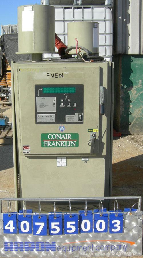 Used Conair Drying System consisting of: (1) Conair dehumidifying dryer, model CD200, 150 CFM, temperature range 160 - 250 Degrees F. 3 desiccant cartridges. 3/60/480 Volt. Includes Compudry control ...