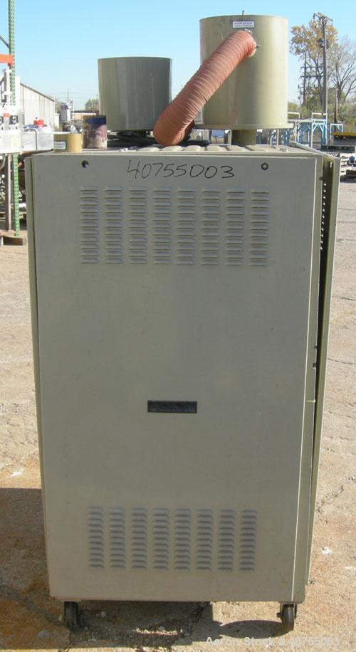 Used Conair Drying System consisting of: (1) Conair dehumidifying dryer, model CD200, 150 CFM, temperature range 160 - 250 Degrees F. 3 desiccant cartridges. 3/60/480 Volt. Includes Compudry control ...
