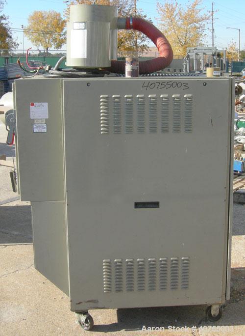Used Conair Drying System consisting of: (1) Conair dehumidifying dryer, model CD200, 150 CFM, temperature range 160 - 250 Degrees F. 3 desiccant cartridges. 3/60/480 Volt. Includes Compudry control ...