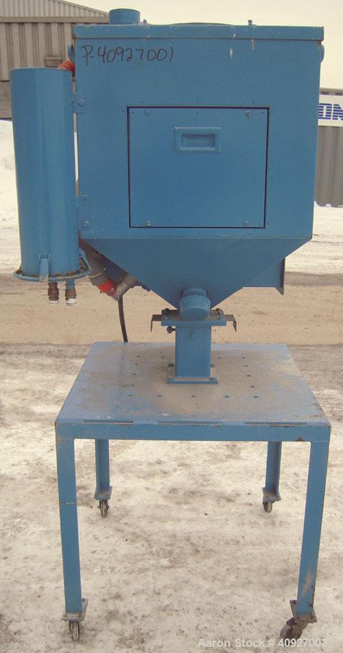 Used Conair Drying System Consisting Of: (1) Conair Dehumidifying Dryer, Model CD30, 30 CFM, 240 Volt. (1) Desiccant cartridge. Includes Compu-Dry control panel and a model 18137101 dry-hop, mounted ...