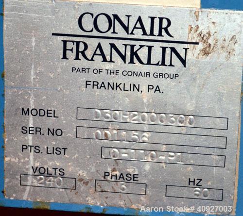 Used Conair Drying System Consisting Of: (1) Conair Dehumidifying Dryer, Model CD30, 30 CFM, 240 Volt. (1) Desiccant cartridge. Includes Compu-Dry control panel and a model 18137101 dry-hop, mounted ...