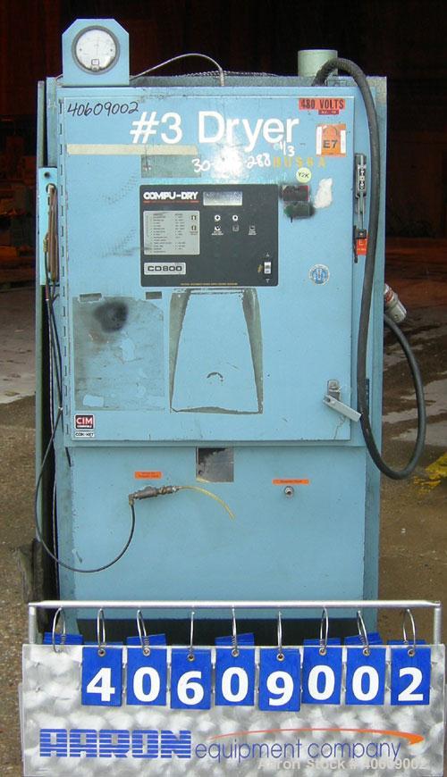 Used Conair dehumidifying dryer, model CD800, 600 cfm. 5 desiccant cartridges. 3/60/480 volt. Includes Compudry control panel, and a model 1805190800SP insulated drying hopper, 44" diameter x 65" str...