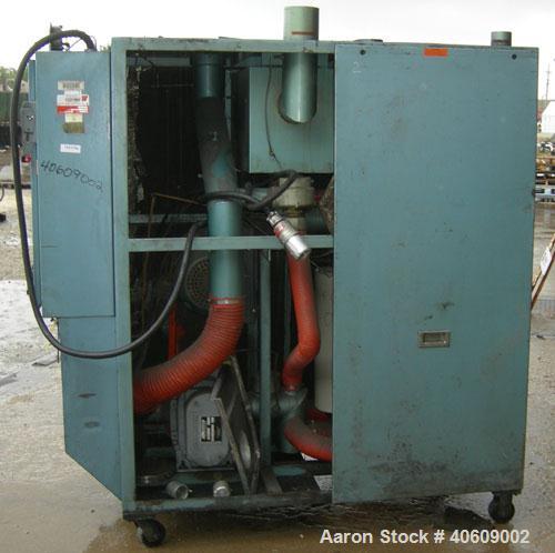 Used Conair dehumidifying dryer, model CD800, 600 cfm. 5 desiccant cartridges. 3/60/480 volt. Includes Compudry control panel, and a model 1805190800SP insulated drying hopper, 44" diameter x 65" str...
