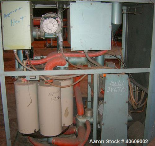 Used Conair dehumidifying dryer, model CD800, 600 cfm. 5 desiccant cartridges. 3/60/480 volt. Includes Compudry control panel, and a model 1805190800SP insulated drying hopper, 44" diameter x 65" str...
