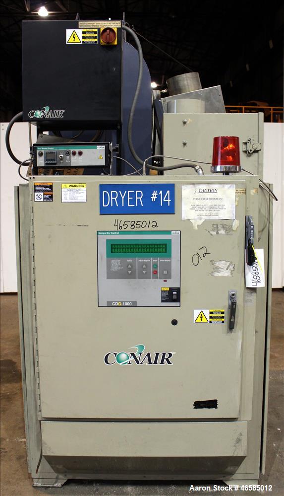 Used Conair Carousel Dehumidifying Dryer, Gas Heated, Model CDG1000, Carbon Steel. Approximate 925 CFM, drying temperature range 160 to 250 degrees F. (5) Desiccant cartridges. Includes CDG1000 Compu...