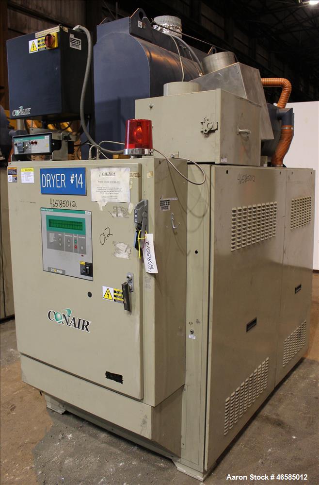 Used Conair Carousel Dehumidifying Dryer, Gas Heated, Model CDG1000, Carbon Steel. Approximate 925 CFM, drying temperature range 160 to 250 degrees F. (5) Desiccant cartridges. Includes CDG1000 Compu...