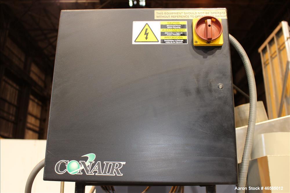 Used Conair Carousel Dehumidifying Dryer, Gas Heated, Model CDG1000, Carbon Steel. Approximate 925 CFM, drying temperature range 160 to 250 degrees F. (5) Desiccant cartridges. Includes CDG1000 Compu...