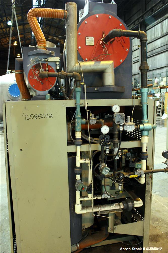 Used Conair Carousel Dehumidifying Dryer, Gas Heated, Model CDG1000, Carbon Steel. Approximate 925 CFM, drying temperature range 160 to 250 degrees F. (5) Desiccant cartridges. Includes CDG1000 Compu...