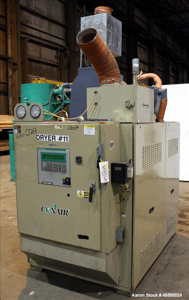 Used Conair Carousel Dehumidifying Dryer, Gas Heated, Model CDG1000, Carbon Steel. Approximate 925 CFM, drying temperature range 160 to 250 degrees F. (5) Desiccant cartridges. Includes CDG1000 Compu...