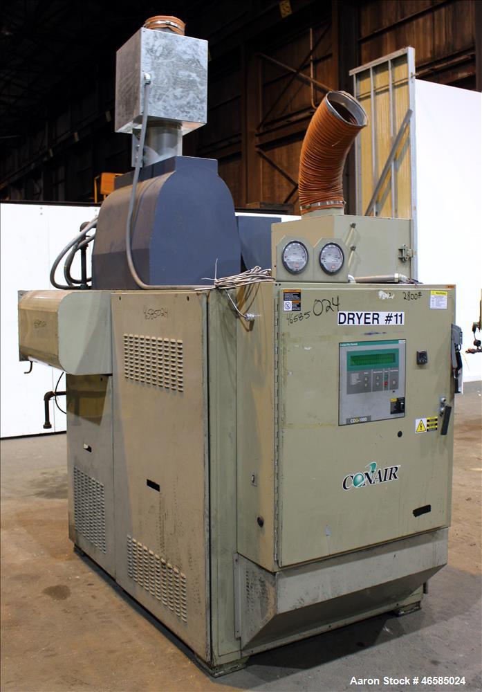 Used Conair Carousel Dehumidifying Dryer, Gas Heated, Model CDG1000, Carbon Steel. Approximate 925 CFM, drying temperature range 160 to 250 degrees F. (5) Desiccant cartridges. Includes CDG1000 Compu...